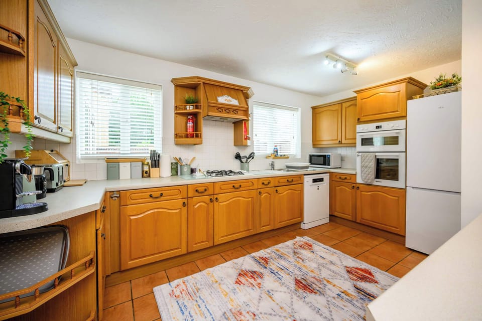 Fully equipped kitchen. Features modern, full-sized appliances and is generously stocked with high-quality cookware, utensils, and dishware. 

