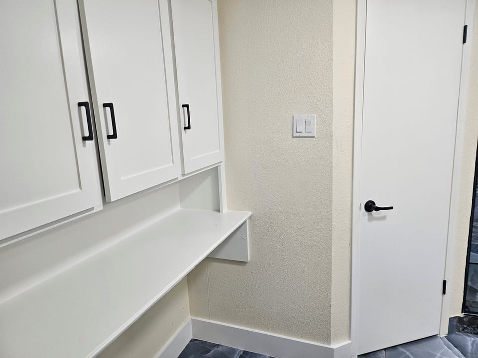 Cabinets and "his" closet.