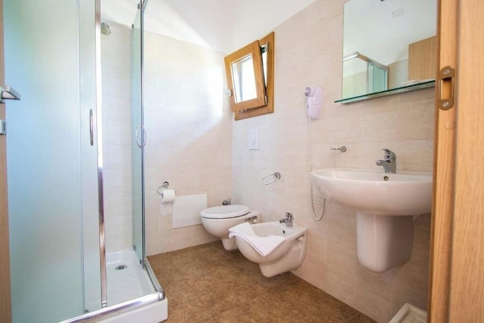 Bathroom | Shower, hair dryer, towels, soap