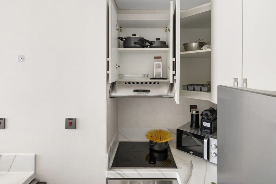 Fully stocked with spoons, forks, and utensils for everyday use.
