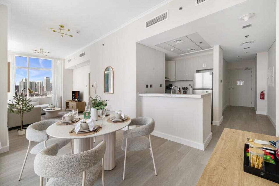 Kitchen and dining area with modern amenities.