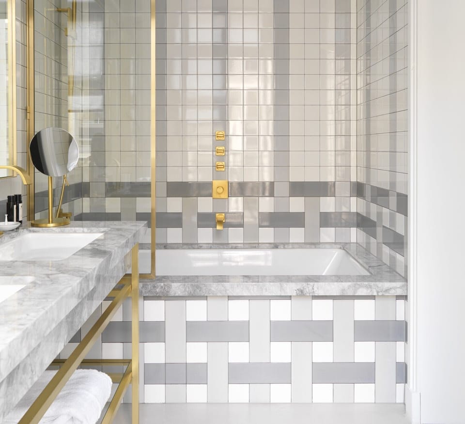 Combined shower/tub, designer toiletries, hair dryer, bathrobes