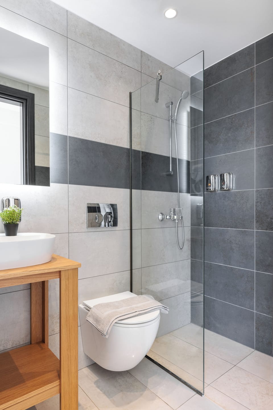 Shower, eco-friendly toiletries, hair dryer, towels