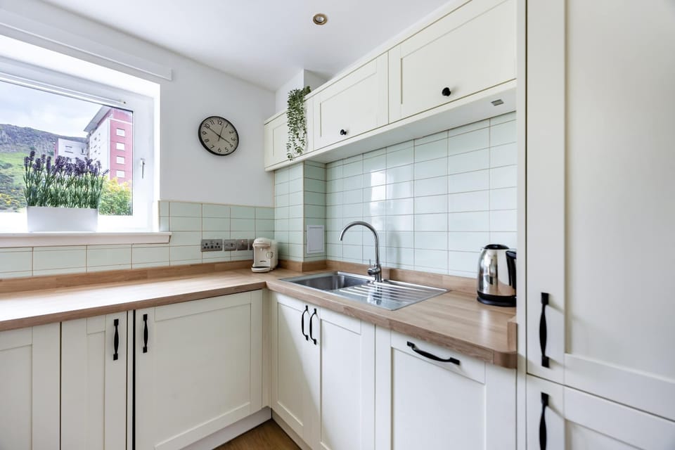 The kitchen is fully equipped to prepare a simple meal 