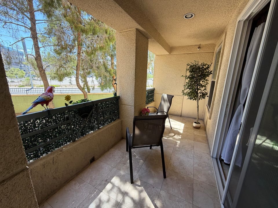 Balcony with Strip views - it offers a relaxing outdoor retreat.