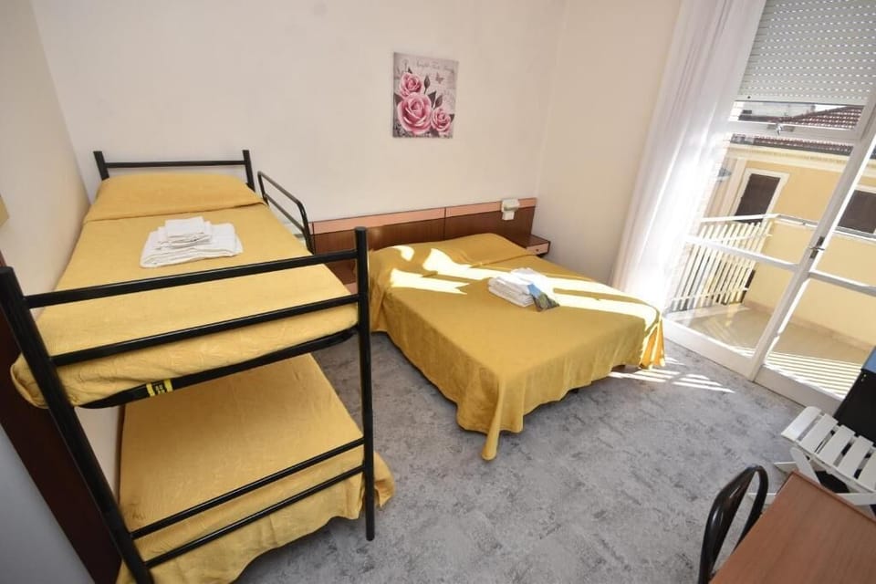 Standard Quadruple Room, Balcony, City View | In-room safe, desk, blackout drapes, iron/ironing board (on request)