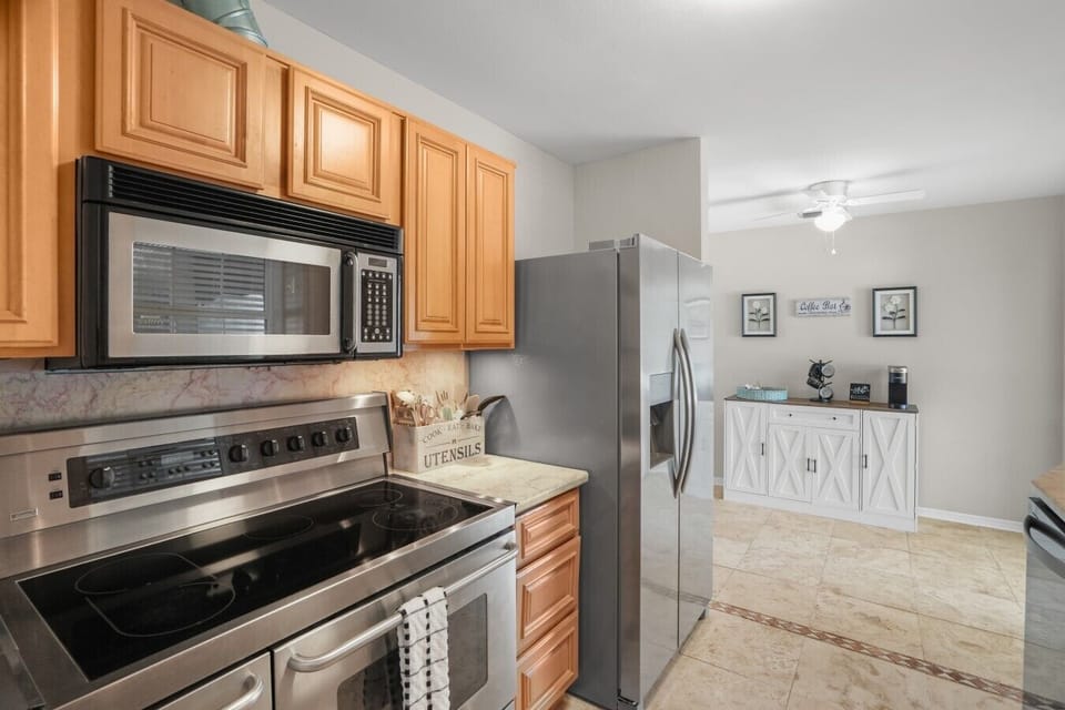 This kitchen offers an oversized range, brand new fridge with purified water dispenser and ice maker, tons of cabinet space and all the essentials you need to cook up a 5 star meal
