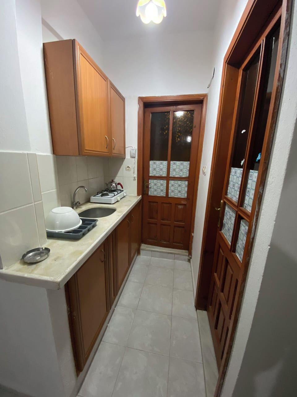 Standard Triple Room, Balcony, City View | Private kitchen | Fridge, stovetop, cookware/dishes/utensils