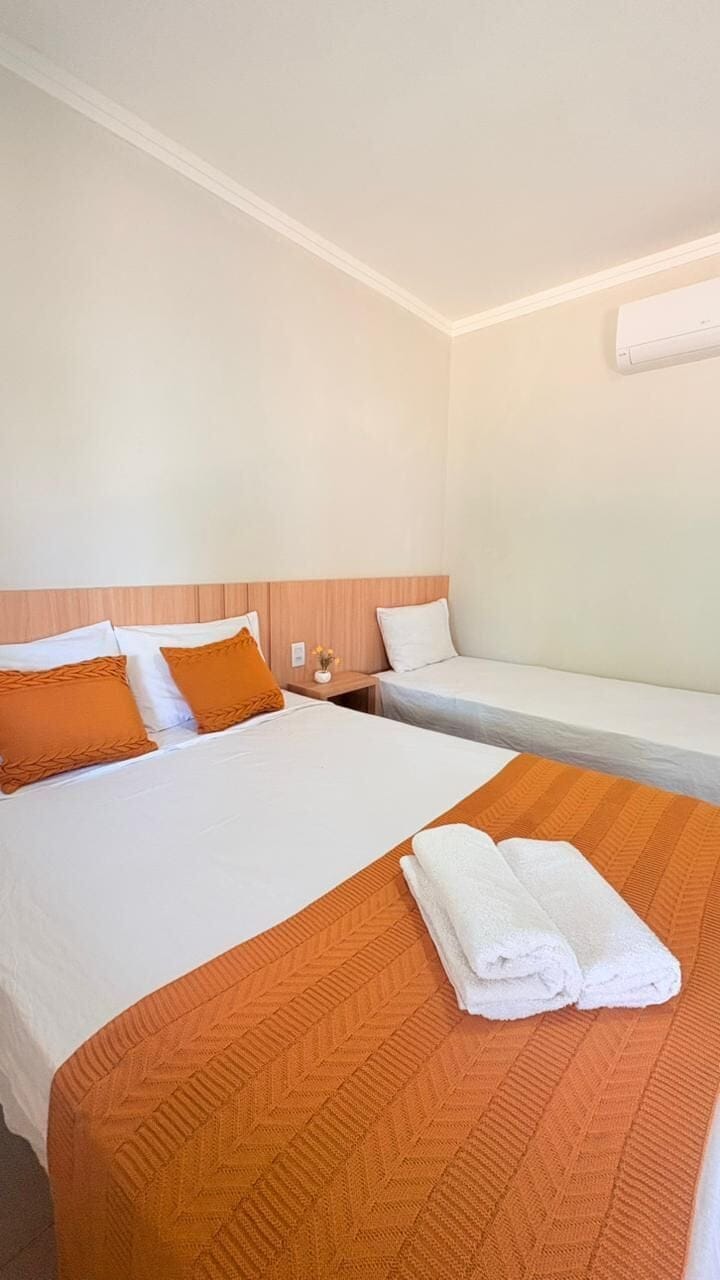 Triple Room | Bathroom | Shower, free toiletries, towels, soap