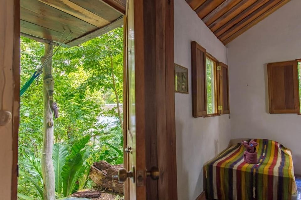Basic Triple Room, Patio, Courtyard View | WiFi (free), bed sheets