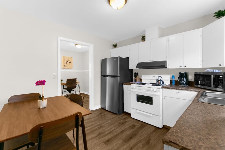 Intimate kitchen dining space designed for easy meals, coffee chats, and staying connected while cooking
