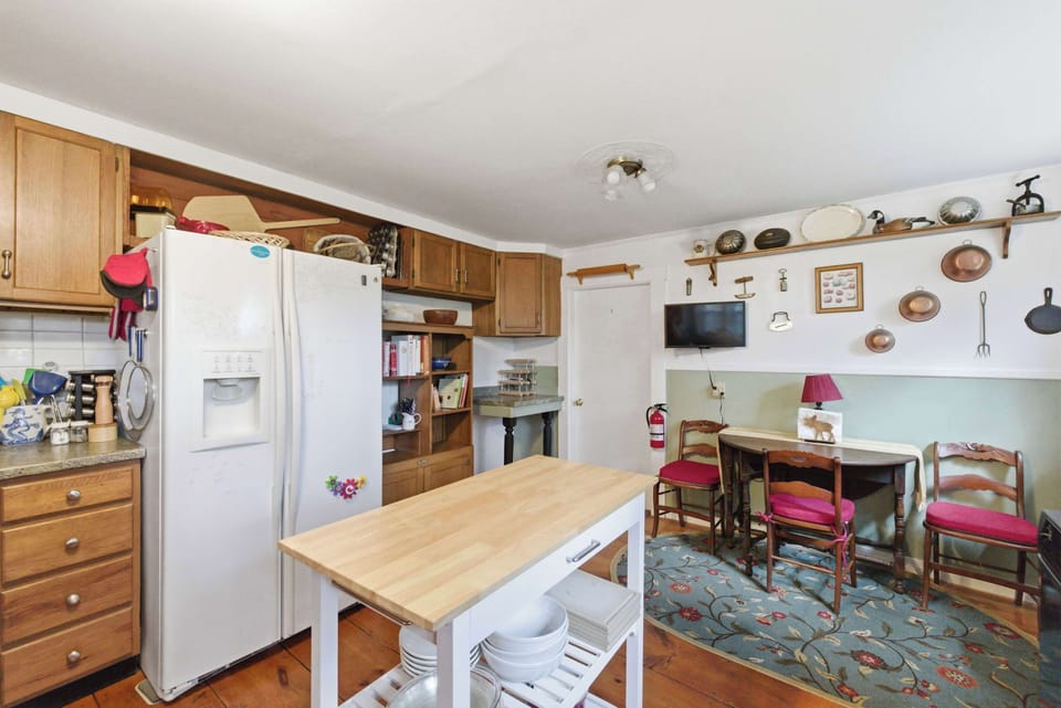 Prep ingredients comfortably at the kitchen island while chatting with family and friends.