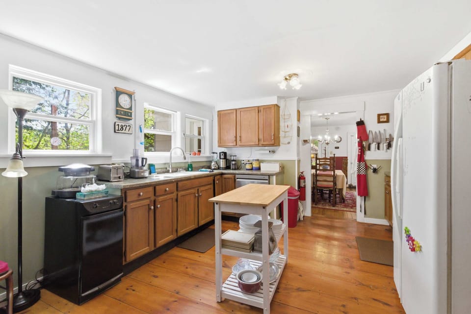Fully stocked cabinets and modern appliances make it easy to whip up your favorite recipes.