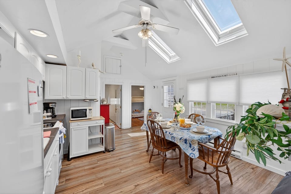 Dining space with seating for four, perfect for shared meals and simple moments at home.