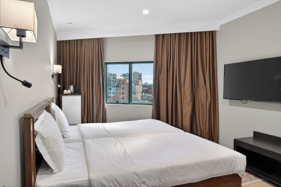 Deluxe Double or Twin Room, City View | Desk, laptop workspace, free WiFi, wheelchair access