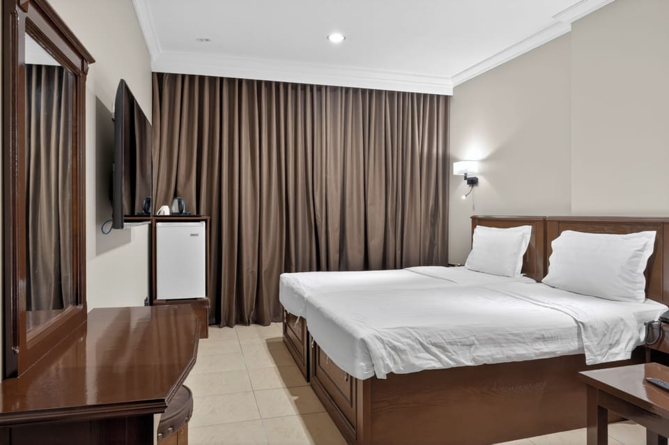 Deluxe Double or Twin Room, City View | Desk, laptop workspace, free WiFi, wheelchair access