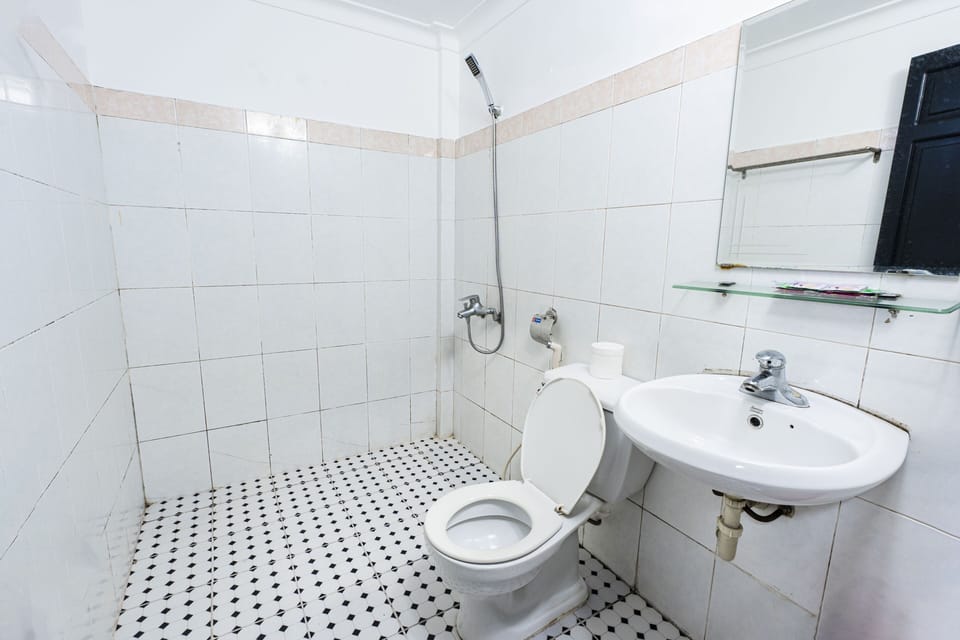 Shower, free toiletries, hair dryer, slippers