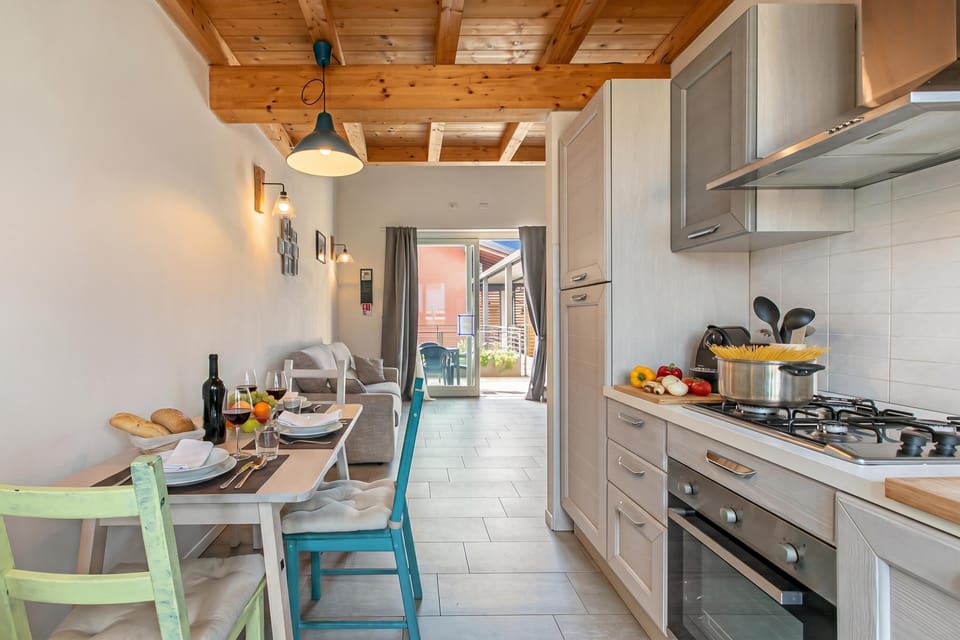 Family Apartment, 1 Bedroom, Microwave (Cozy Ispra Residence with Terrace,) | Private kitchen