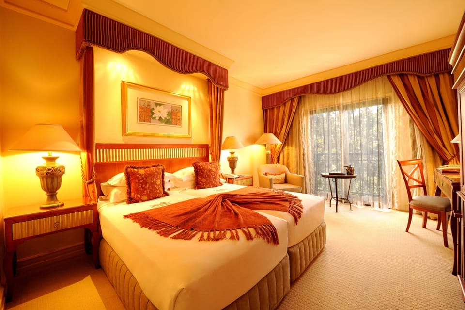 Premium bedding, memory foam beds, minibar, in-room safe