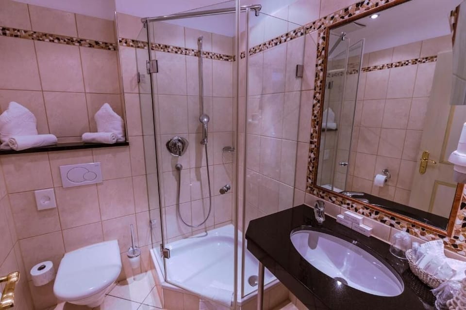 Hair dryer, towels, soap, shampoo