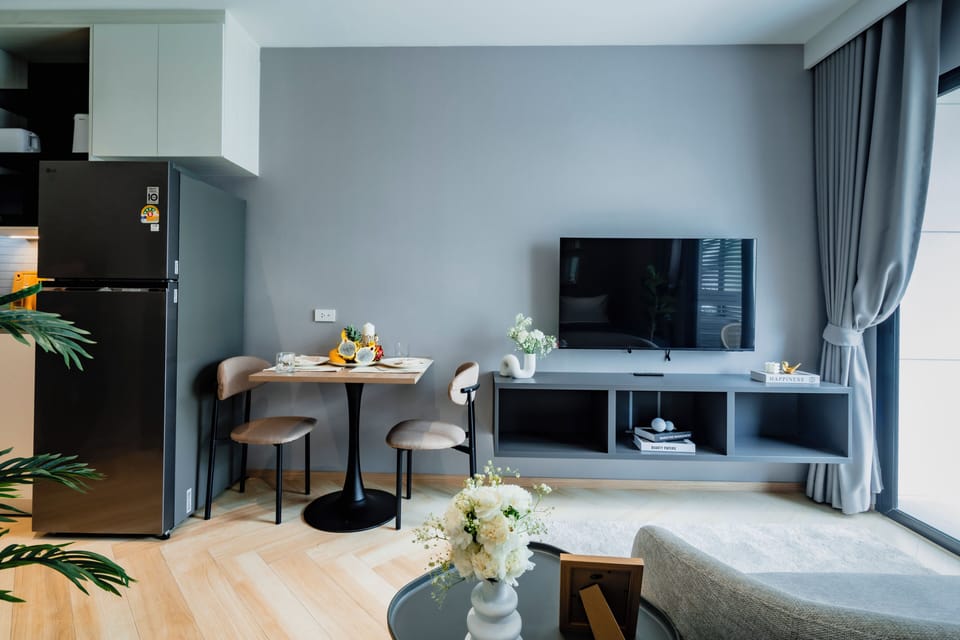 Classic Studio, Balcony, Pool View | Living area | 15-inch Smart TV with cable channels