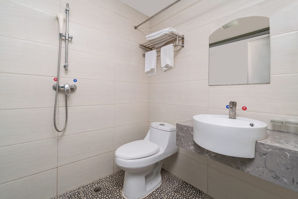 Family Triple Room, Patio | Bathroom | Shower, hair dryer, towels, shampoo