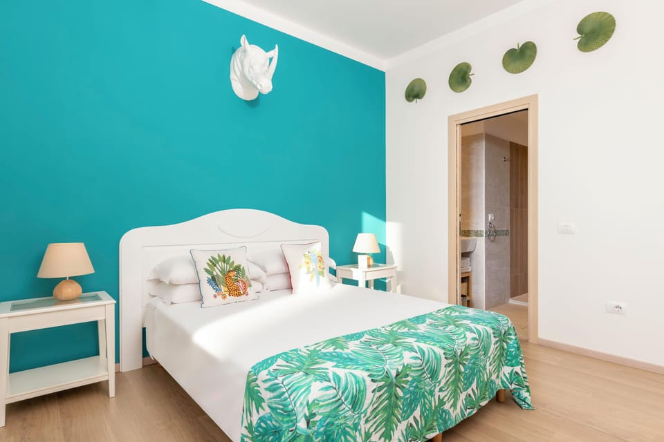Family Triple Room, Balcony, City View | Desk, iron/ironing board, free WiFi