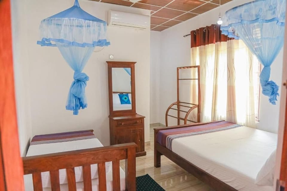 Deluxe Triple Room, Garden View | Free WiFi