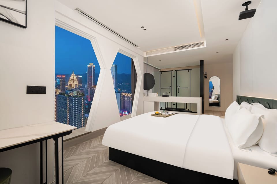 Deluxe Double Room, City View | Desk, WiFi (free), bed sheets