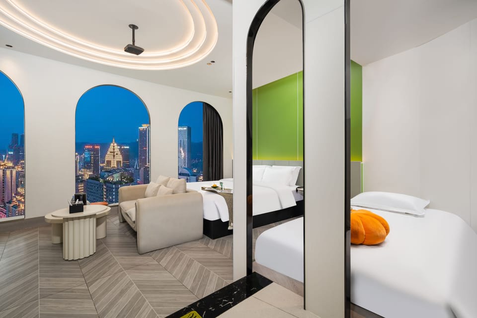 Family Triple Room, City View | Desk, WiFi (free), bed sheets