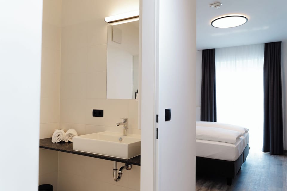 Shower, towels, toilet paper
