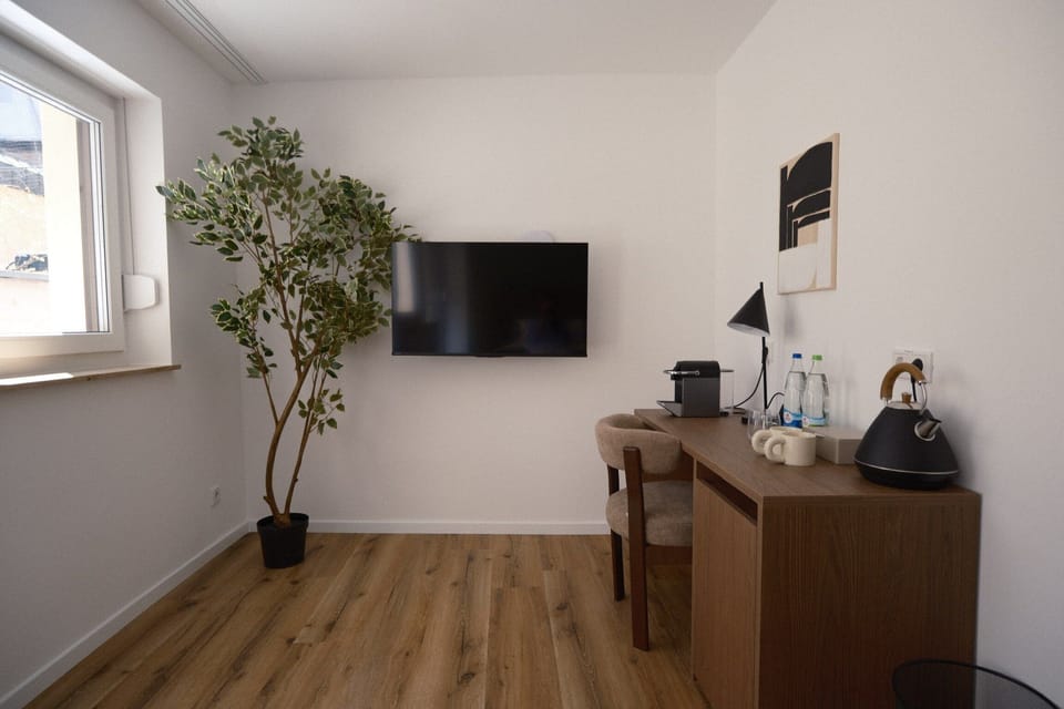 Deluxe Double Room, City View | Desk, laptop workspace, blackout drapes, soundproofing