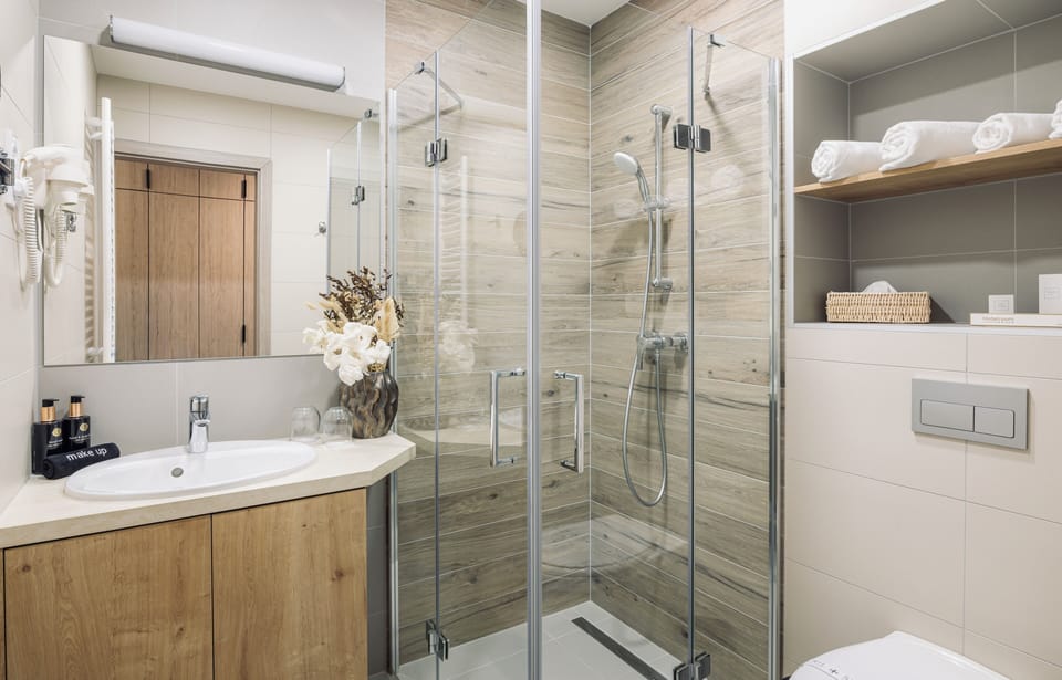 Classic Double or Twin Room | Bathroom | Hair dryer, slippers, towels, soap