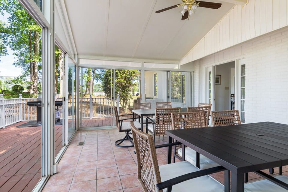 “Spacious dining area with tables for family gathering