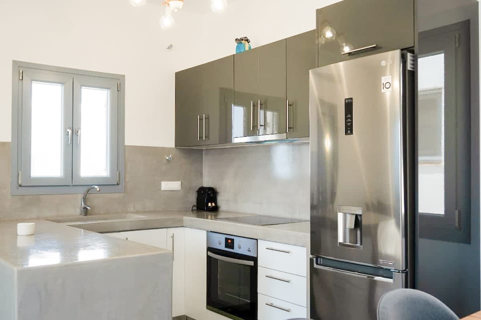 Fully equipped modern kitchen with everything needed for a comfortable stay.