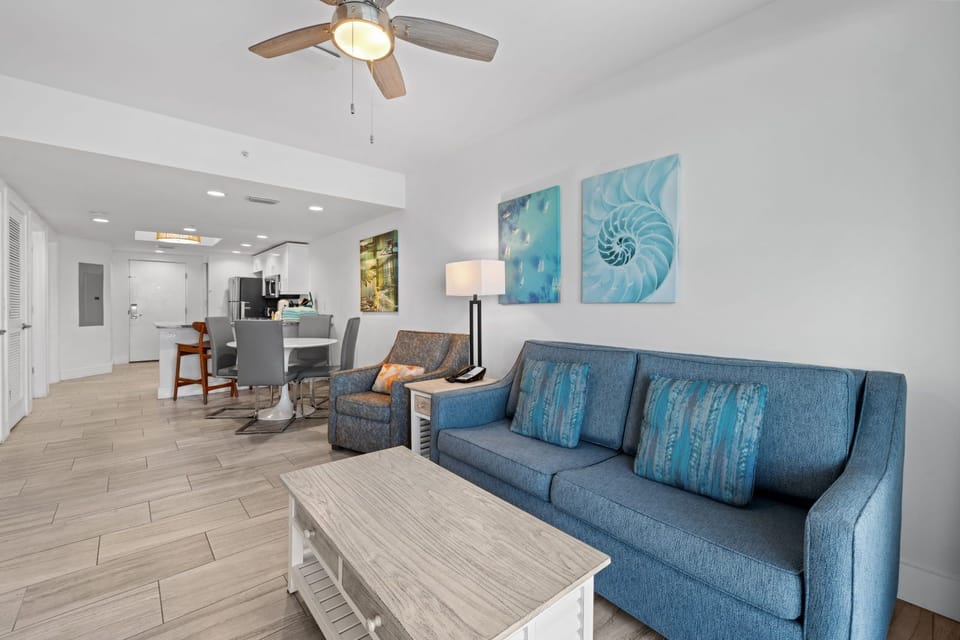 Stylish seating invites you to gather and share stories, with a cozy ambiance throughout the space.