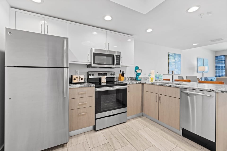 Experience modern living with updated kitchen appliances and lovely finishes that invite creativity and comfort.