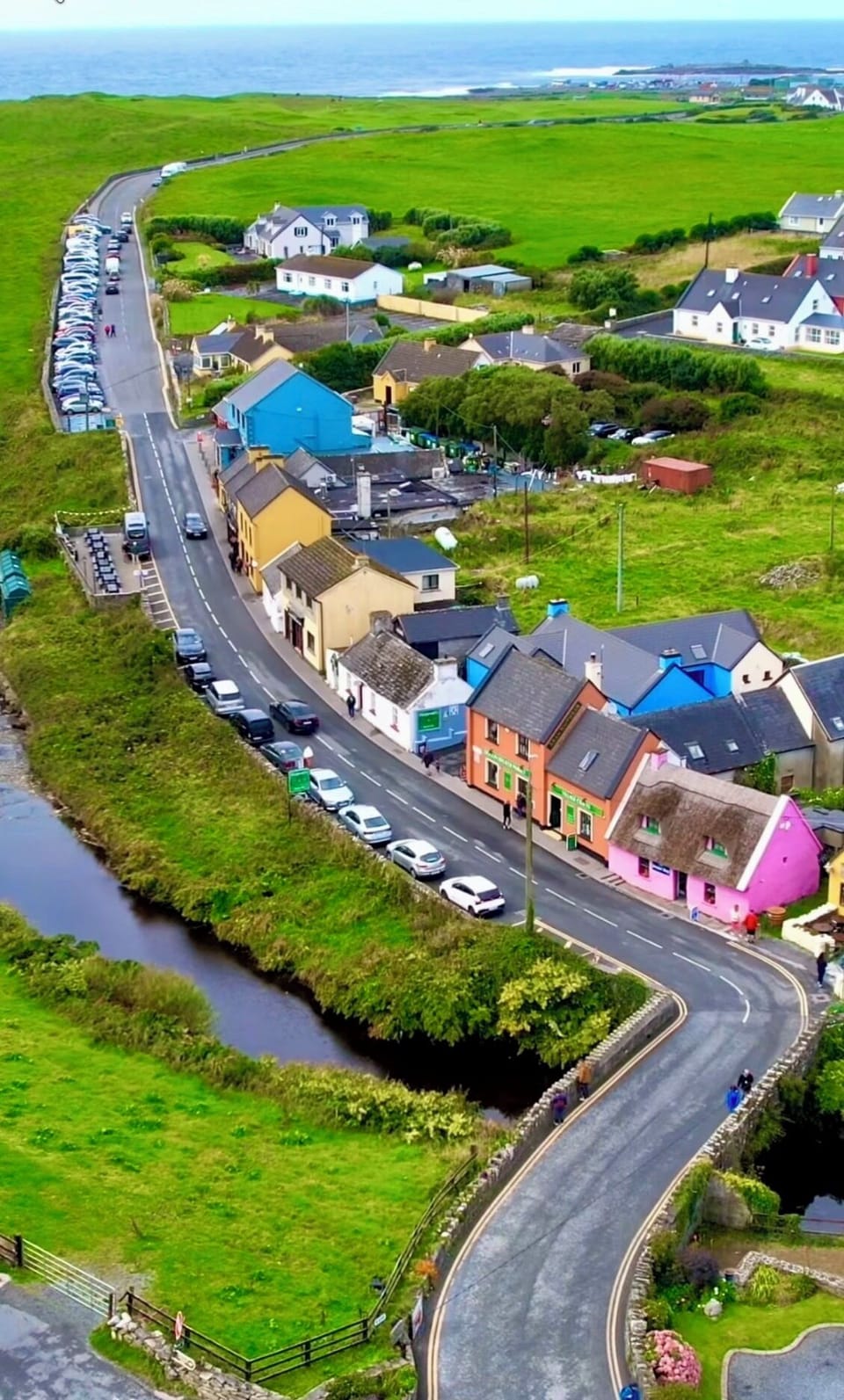 Colourful picturesque Doolin village for traditional music & Aran Islands ferry 