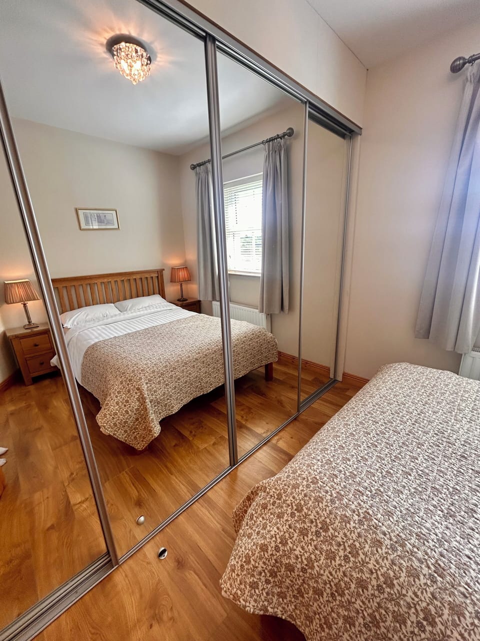 Large spacious mirrored wardrobes with clothes hangers, extra blankets,  pillows