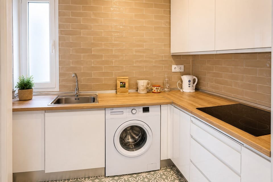 Comfort Apartment | Private kitchen | Electric kettle, dining tables