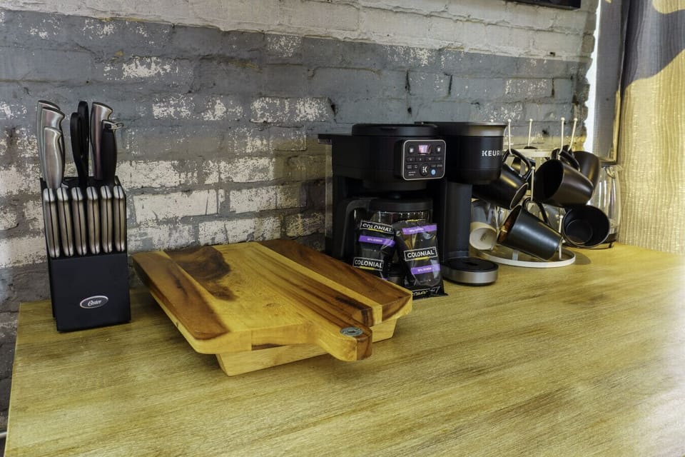 Start your morning right at the dedicated coffee bar. Whether you prefer a fresh French press, a quick Keurig, or a full pot for the group, we’ve stocked every essential for your sunrise brew.