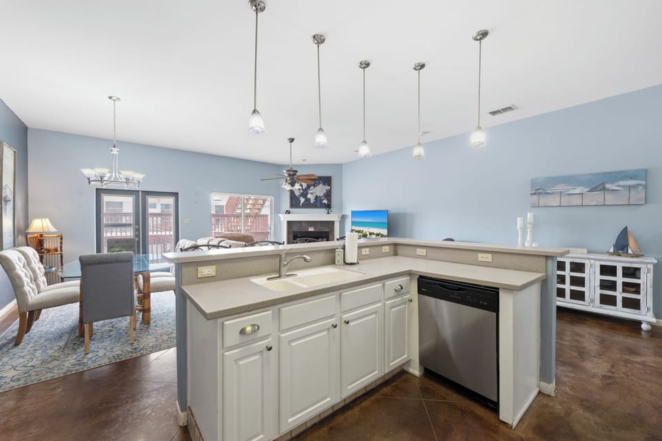Step into your bright, open-concept haven where the kitchen flows seamlessly into the living and dining areas. Enjoy cooking at your spacious island, then unwind on your private balcony.