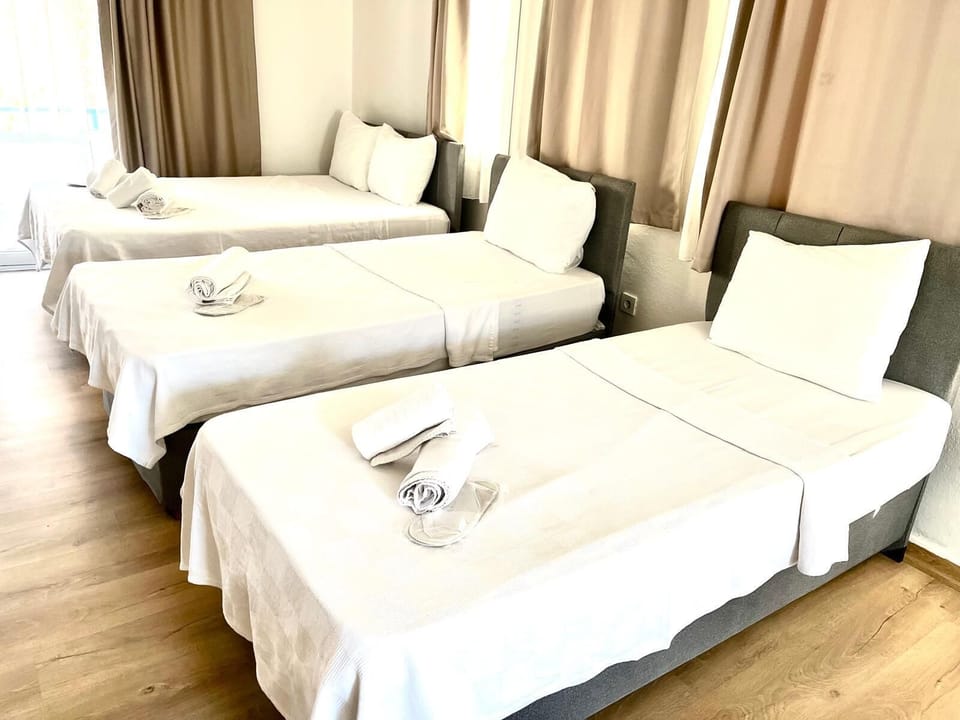 Quadruple Room, Balcony, Garden View | Premium bedding, free WiFi