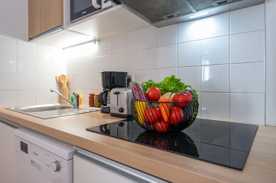 The kitchenette workstation — stocked with all the basics so you can cook like a local.