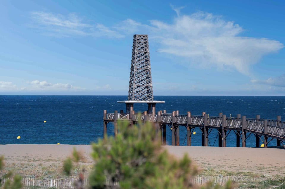 The iconic pier of Port Leucate stretching out over the Mediterranean — a short stroll from the residence.