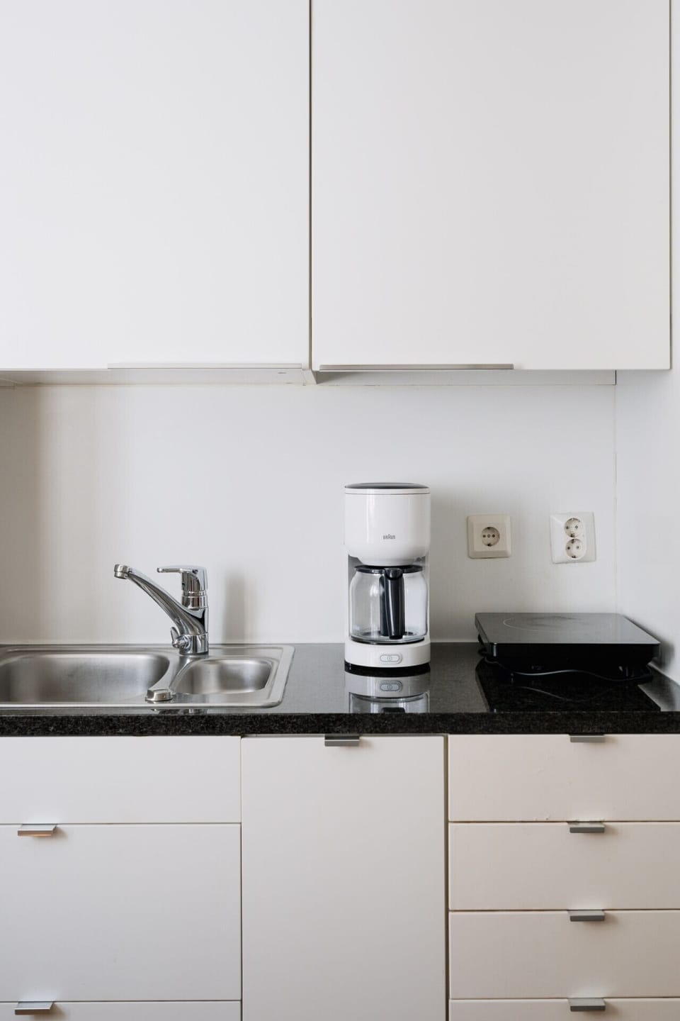 From a fresh brew in the morning to a quick meal on the induction cooktop, you have all the tools needed for a convenient self-catering experience.