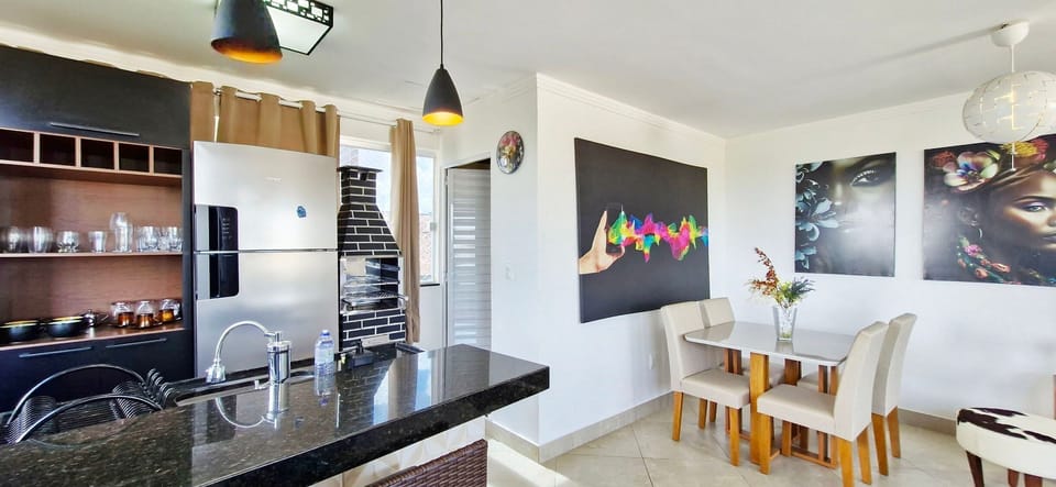 Basic Apartment | Private kitchen | Fridge, microwave, cookware/dishes/utensils, dining tables