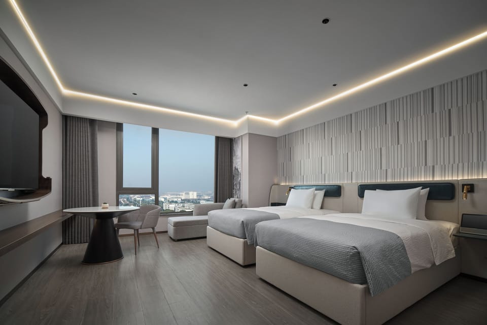 Standard Twin Room | Desk, blackout drapes, iron/ironing board (on request), WiFi (free)
