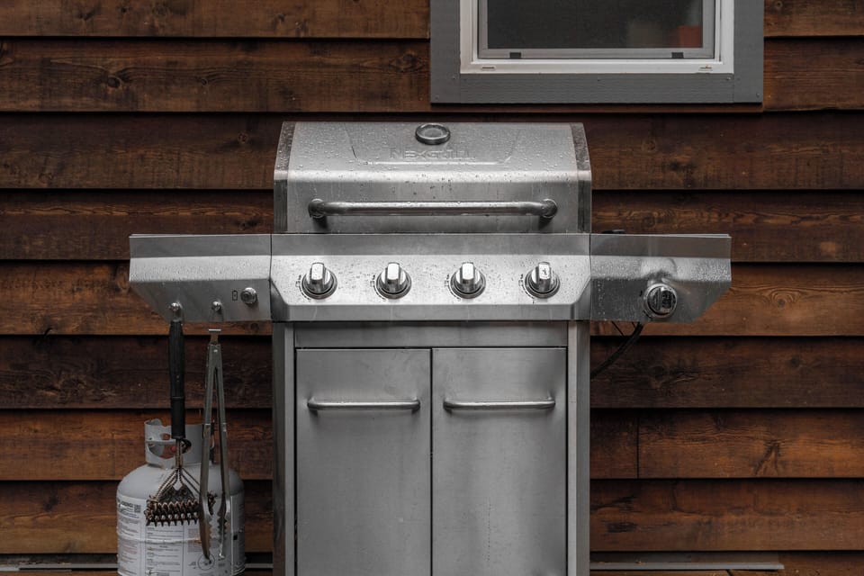 Private outdoor gas grill for easy cookouts and relaxed vacation meals
