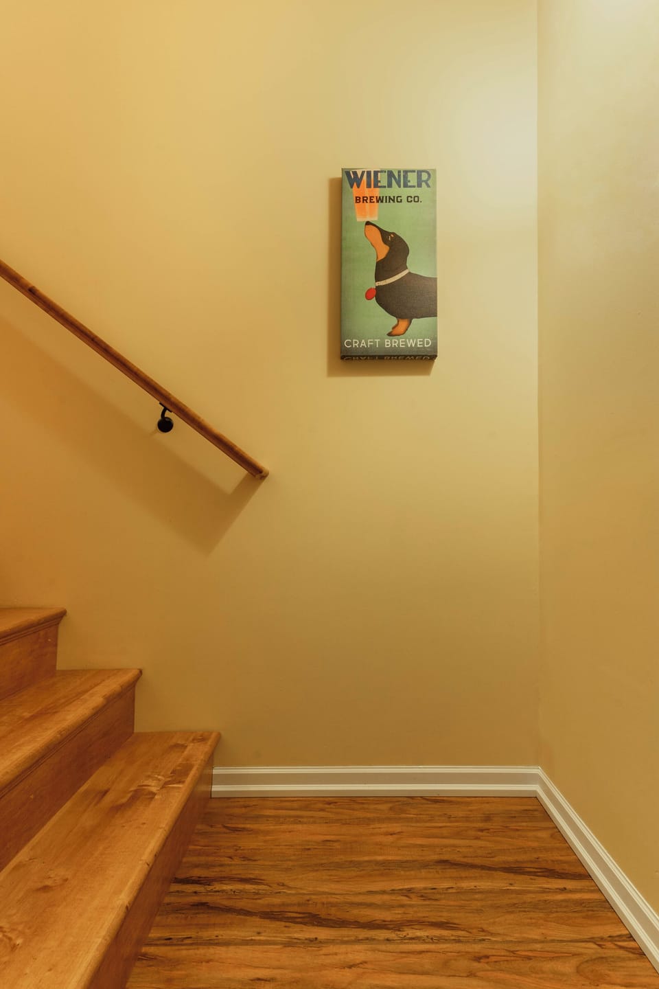 Wood stair landing with playful decor